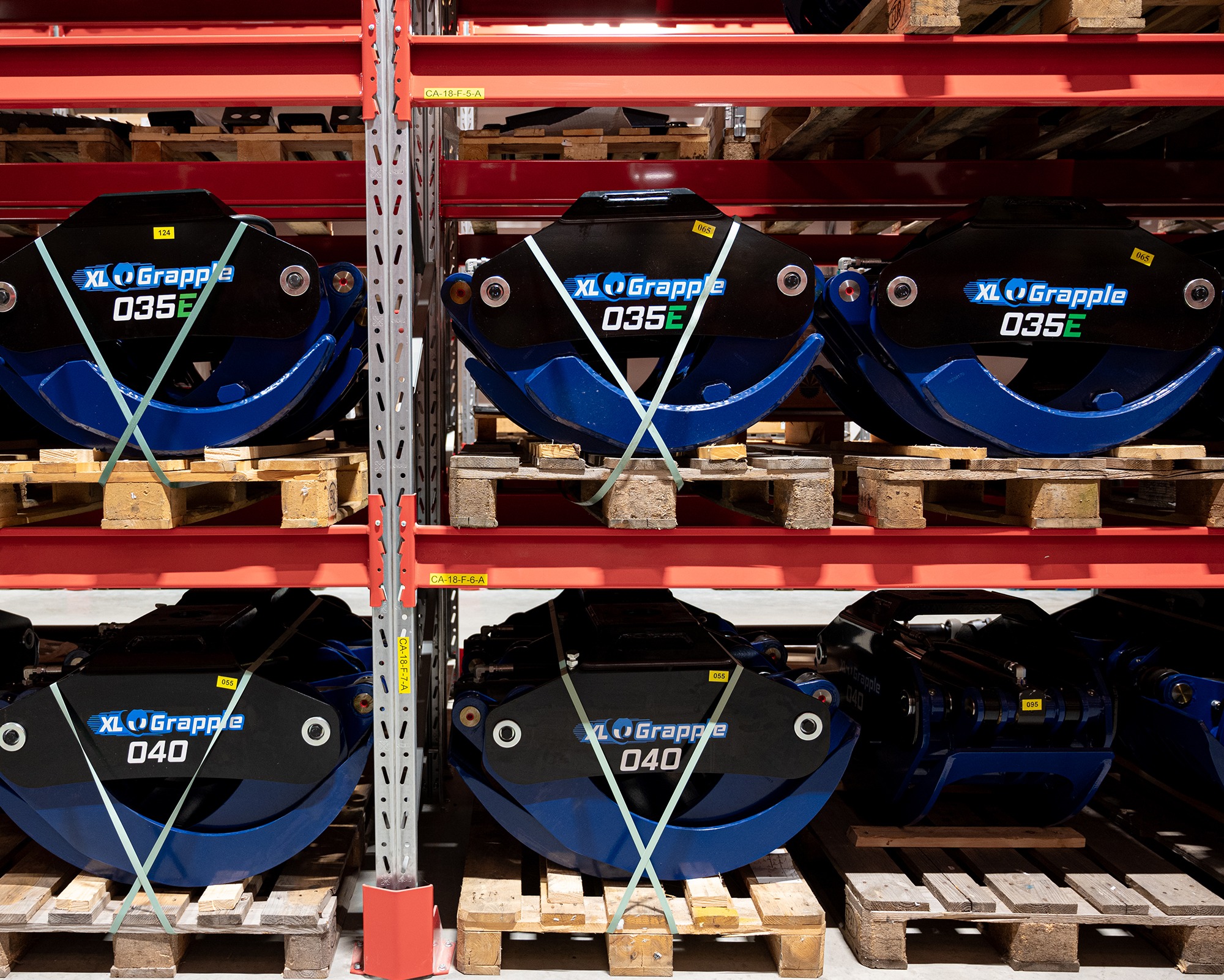 XL Grapple-gripar på lagerhyllor